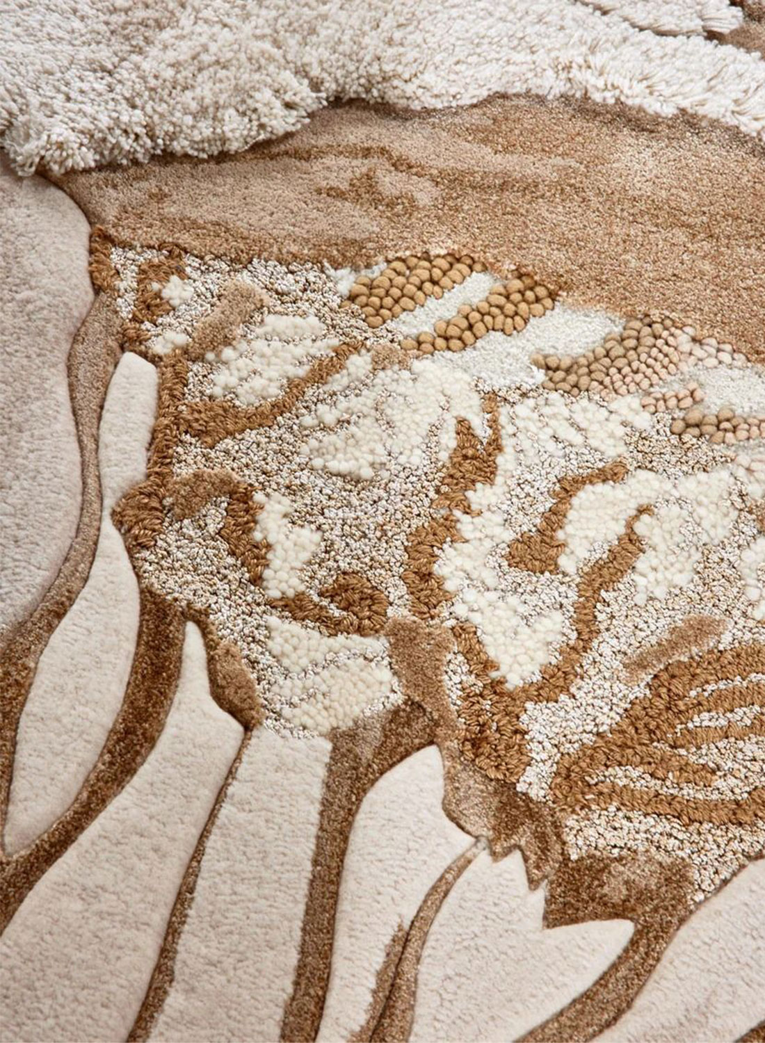 Bespoke rug with variety of textured elements and tonal hues.