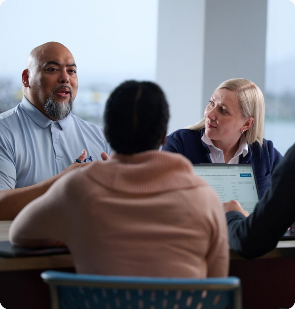 Mirum managers in a group discussion at a leadership workshop