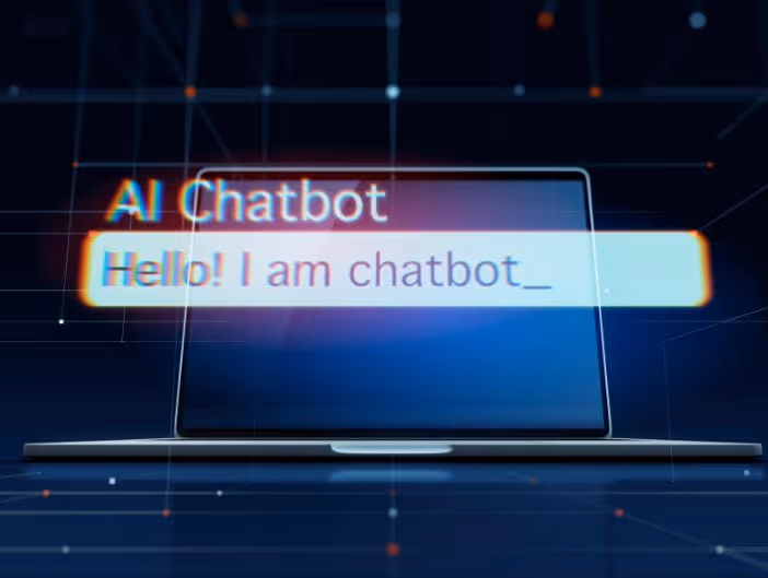 Laptop screen displaying a chat interface with the text 'AI Chatbot' and the chatbot message 'Hello! I am chatbot_' on a digital network background.
