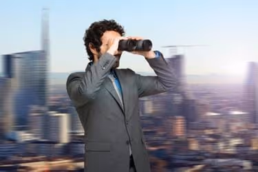 Business man with binoculars