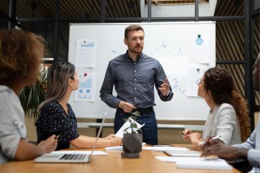 Manager communicating to his employees