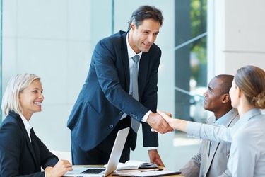 Closing a deal with a handshake