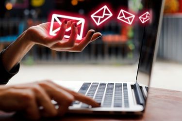 Woman sending emails