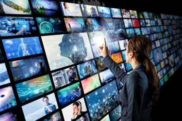 Person choosing video clips