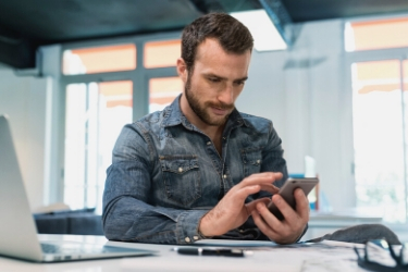man checking his phone