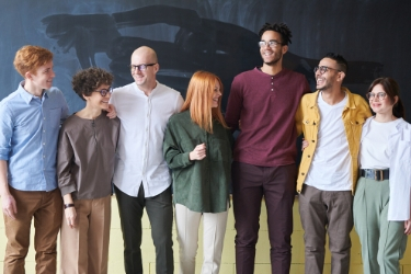 Group of diverse people together as a team