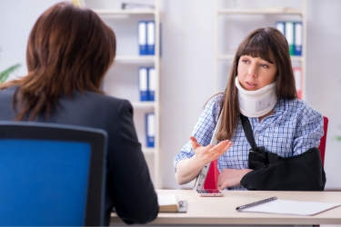 Injured Employee talking to her Employer