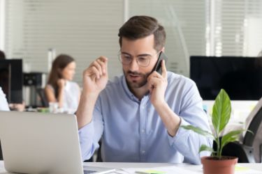 Salesperson practicing a call