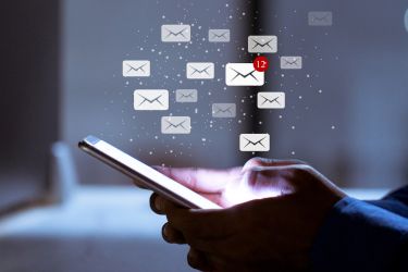 Man receiving emails