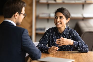 Employee talking to her boss
