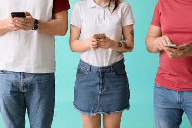 People using their phones