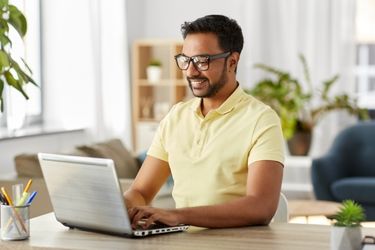 Happy man working from home