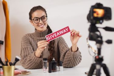 Woman hosting a giveaway