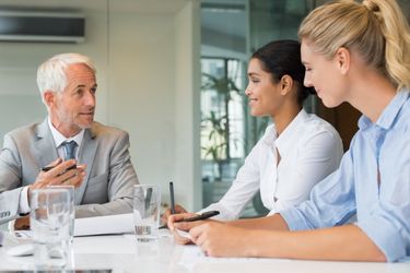 Manager talking to new employees