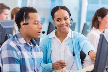 Call center manager clarifying something to new hire