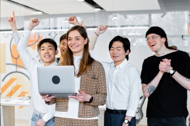 Employees celebrating another employee