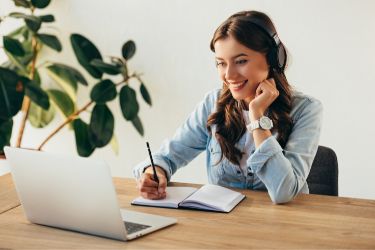 Woman taking a webinar online