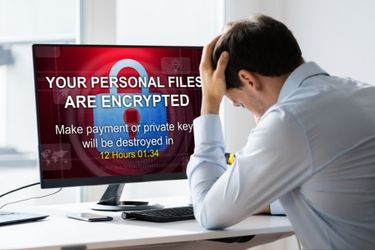 Man with his personal files being encrypted