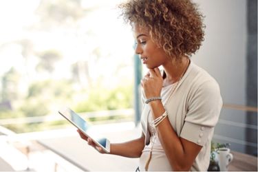 Woman considering marketing products