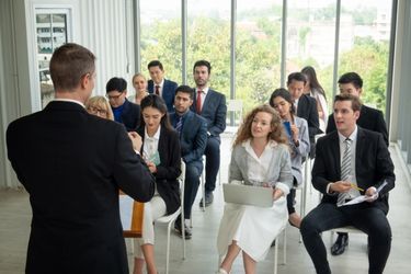 Manager training his staff