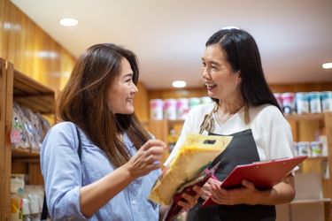 Shopper talking to the owner