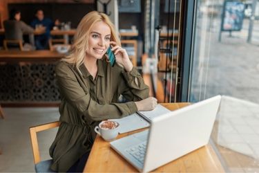 Woman contacting her suppliers
