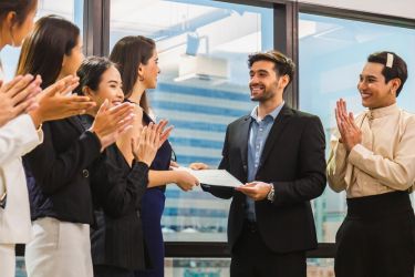 Manager encouraging a teammate