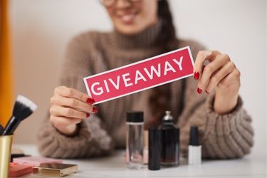 Woman doing a makeup giveaway