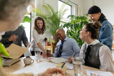 people sitting around a conference table