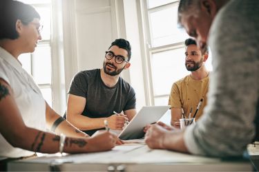 Team discussing how to stay relevant