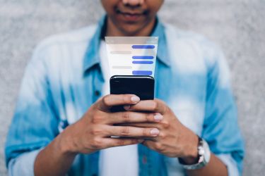 Man chatting with a chatbot