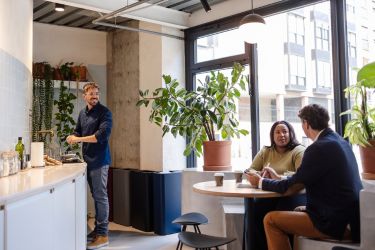 Coffee station with people socializing