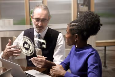 Man explaining AI to another person.