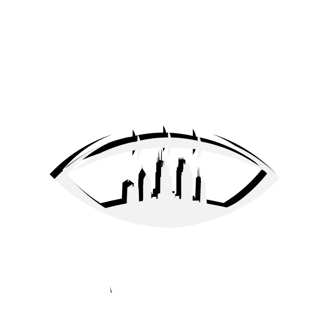 Silhouette of city skyline enclosed within the shape of an American football.