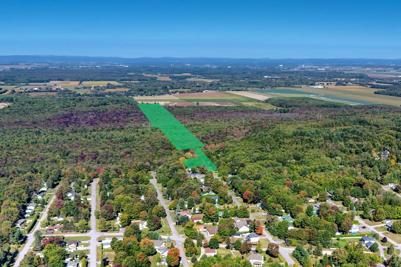 Land 1 million square feet of farmland for specialty crops
