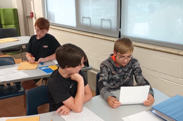AcademyACL students working together in the classroom