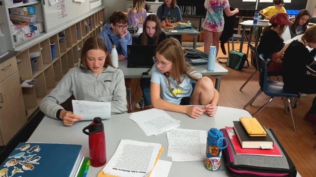 AcademyACL students collaborating on an open-ended problem in the classroom