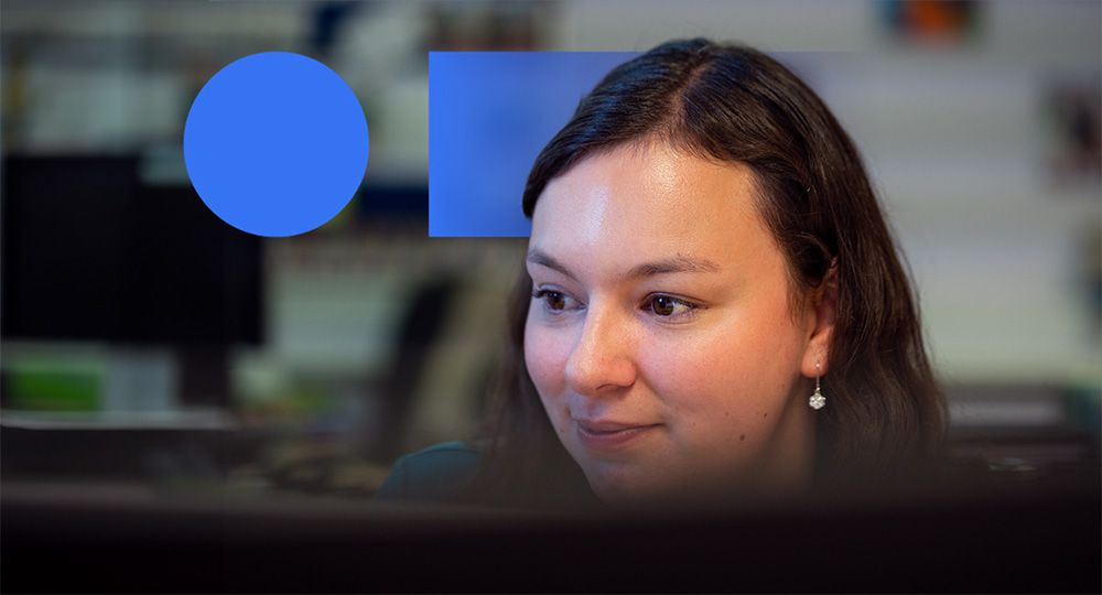 A colleague working at a computer