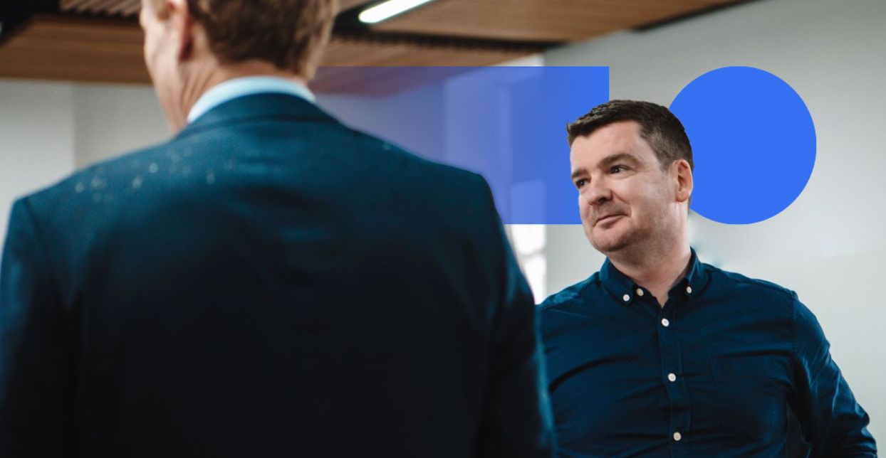 Two colleagues in discussion