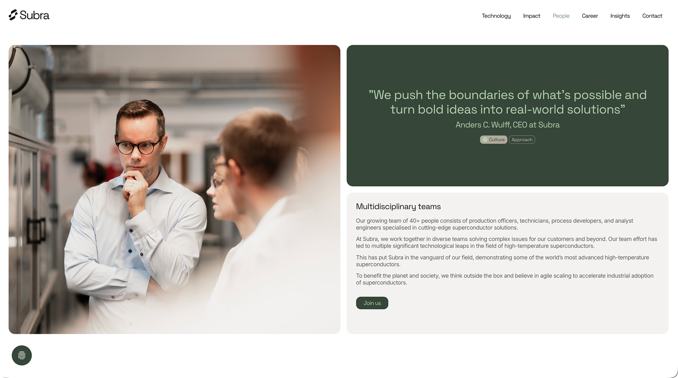 Two professionals deeply engaged in discussion in a modern office environment, alongside a quote from Anders C. Wulff, CEO at Subra about pushing boundaries to create real-world solutions.