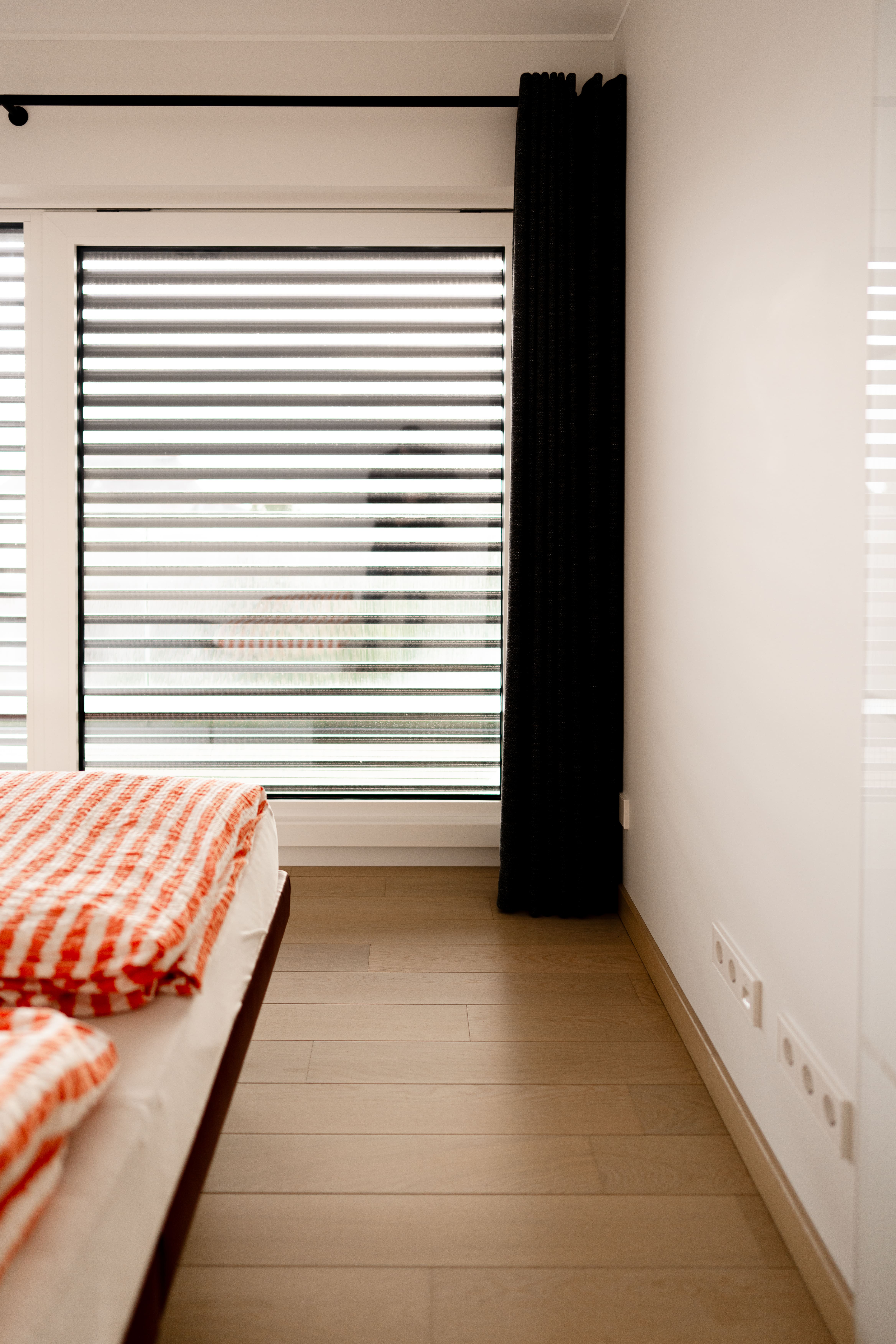 modern bedroom with hardwood floors