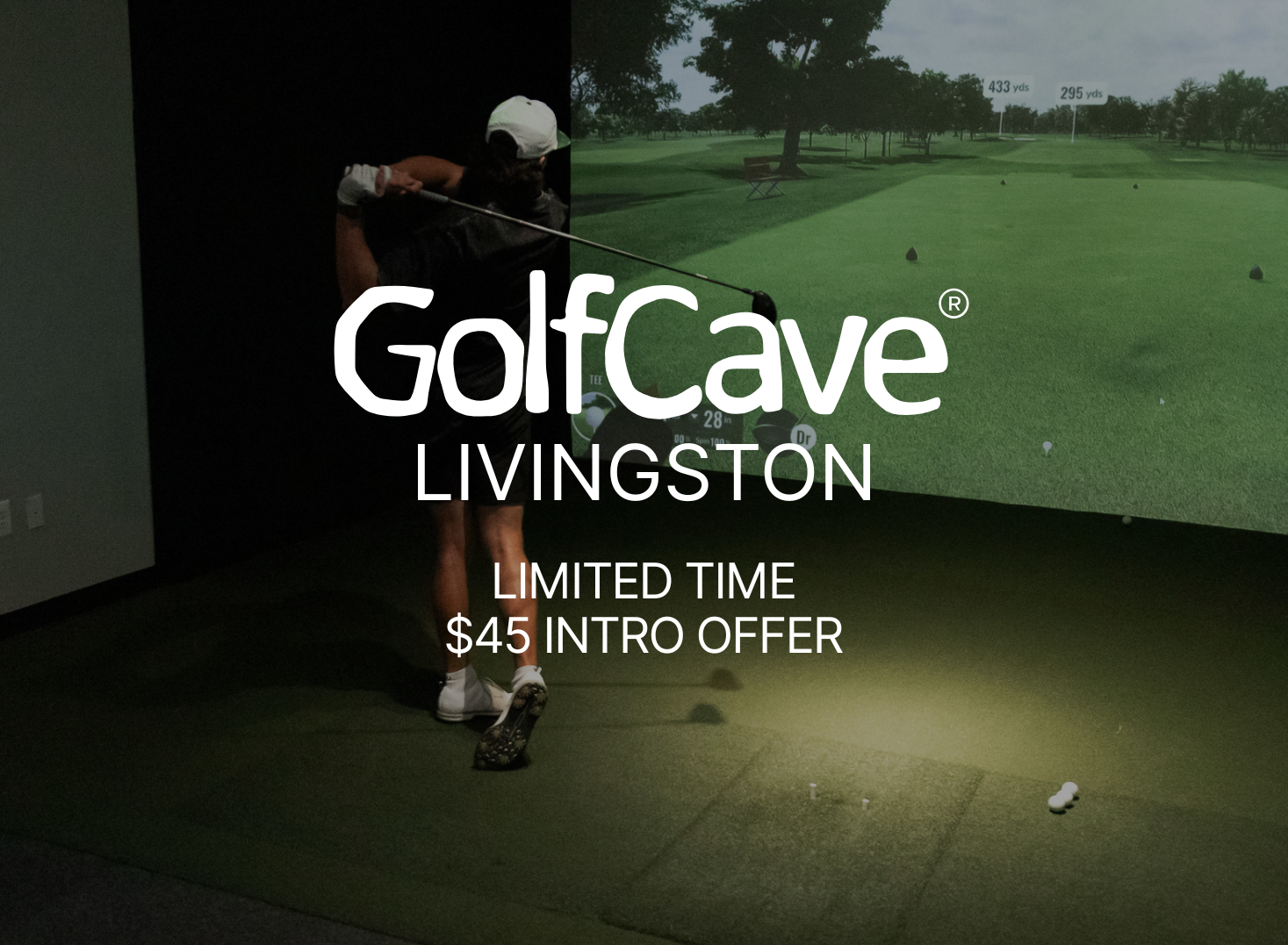 Two men playing golf at the GolfCave. One man is over the ball about to hit while the other watches