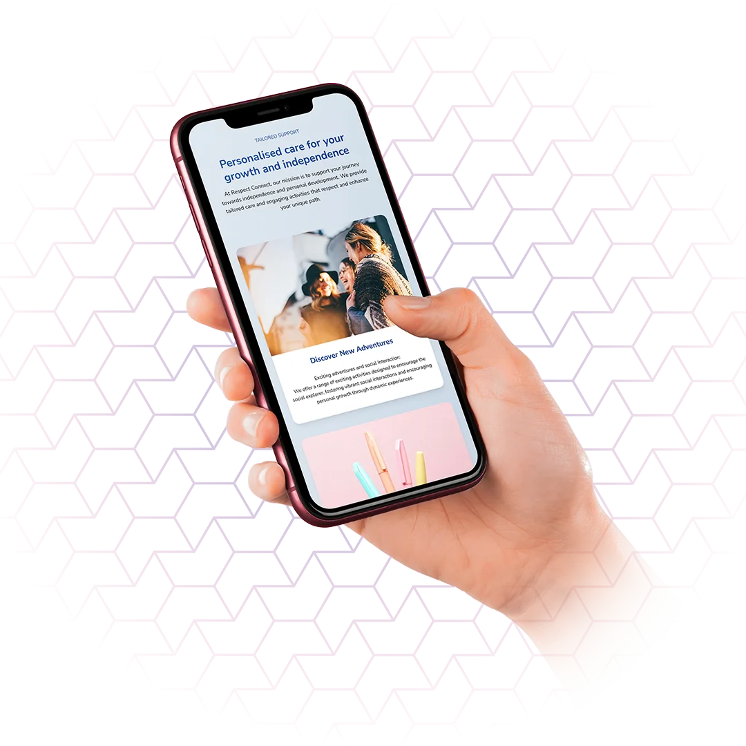 Services: Image of a persons hand, holding a mobile device - featuring a website built by Brandtribal.