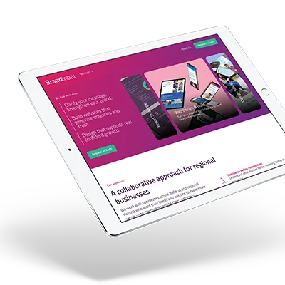Tablet displaying Brandtribal website with services and a collaborative approach for regional businesses.