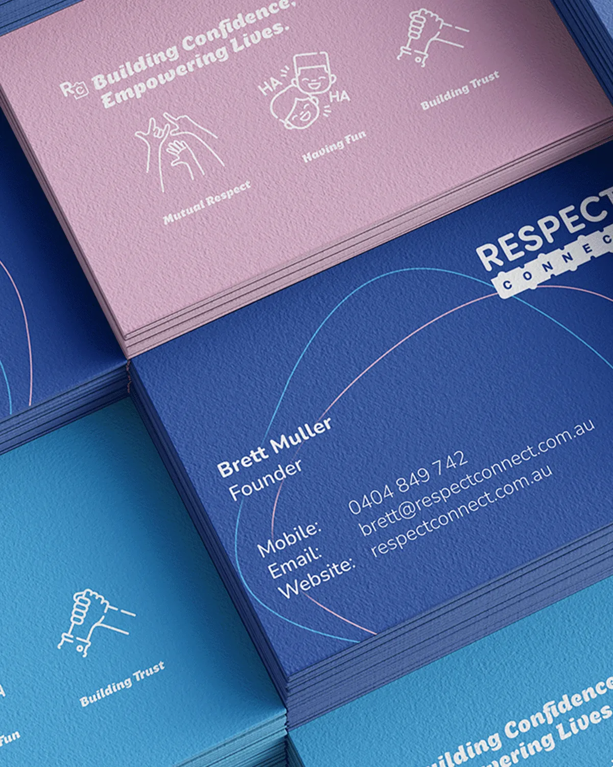 Stack of Respect Connect business cards showing contact info for Brett Muller, Founder, with email and phone.