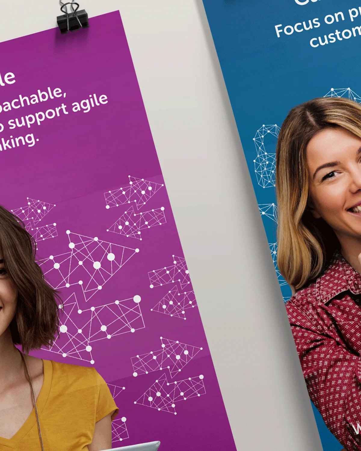 Two Eric Insurance posters with smiling women and geometric arrow designs on purple and blue backgrounds.