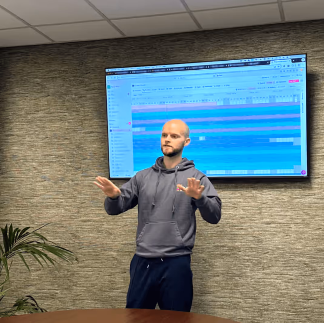 Team member presenting charts and graphs during a report on SEO for Insurance Brokers.