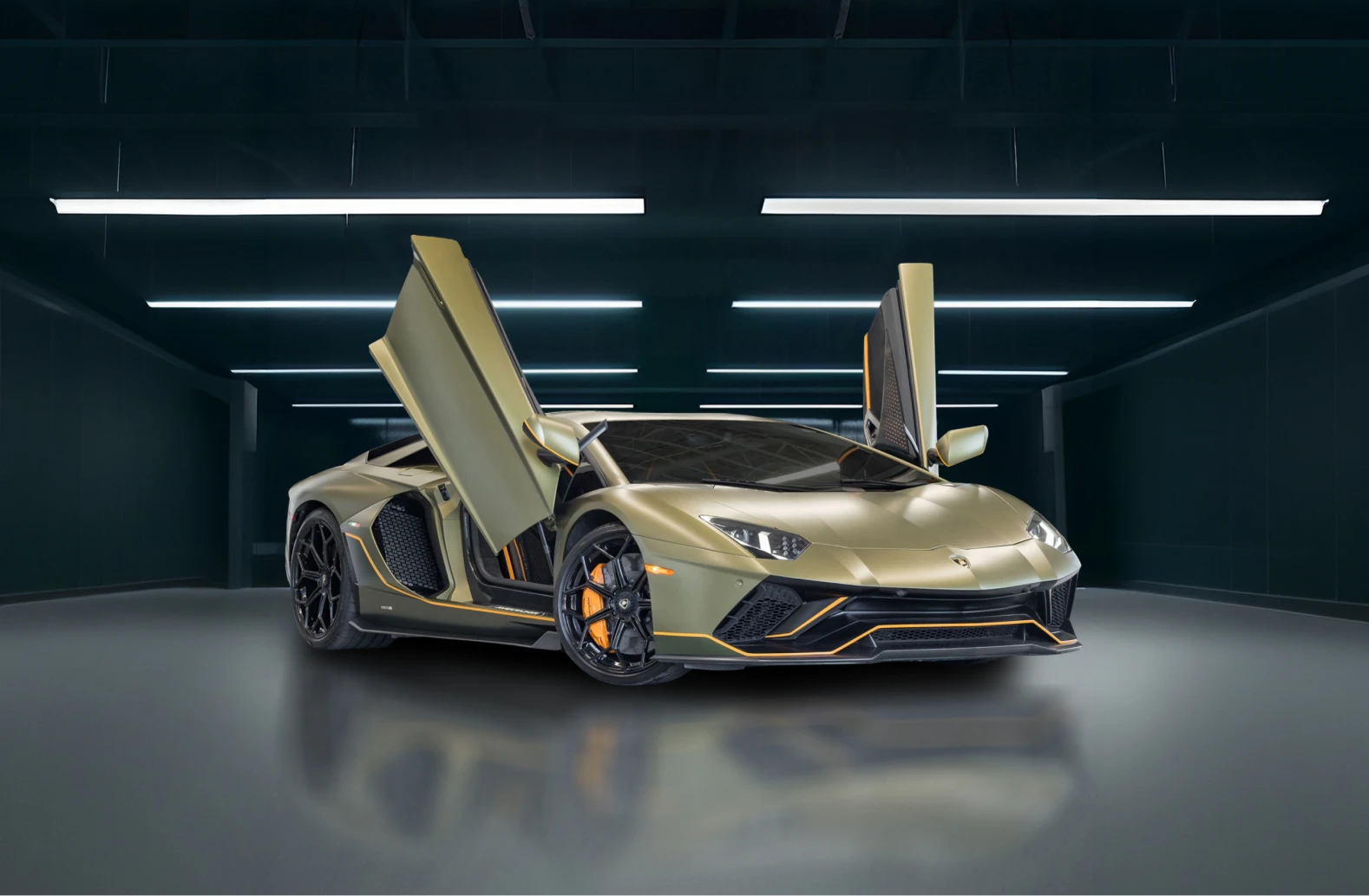 Lamborghini Aventador with scissor doors open in a studio setting, emphasizing bold design and showroom presentation