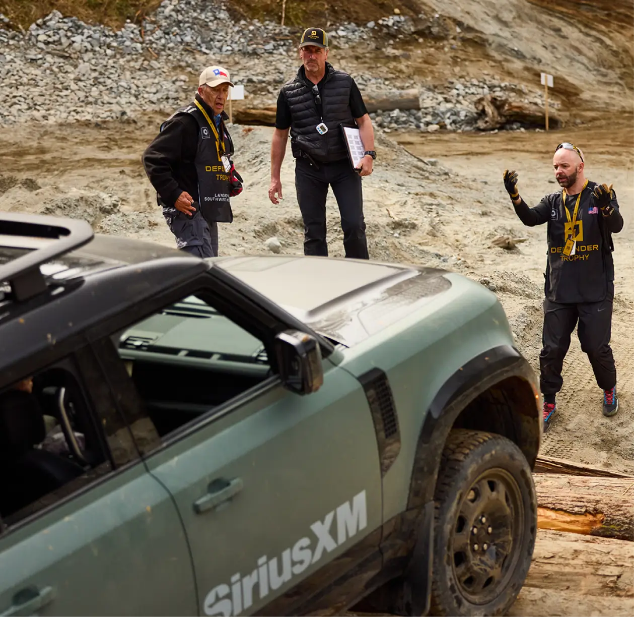 Defender Trophy competitors navigate an off-road challenge as judges assess teamwork, problem solving and expedition capability.