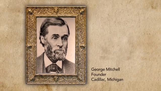 Portrait of George Mitchell in an ornate gold frame with text stating he is Founder in Cadillac, Michigan.